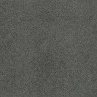 Dark gray nubuck rug with a smooth, matte finish and subtle tonal variations displaying a mottled texture and neutral, solid color.